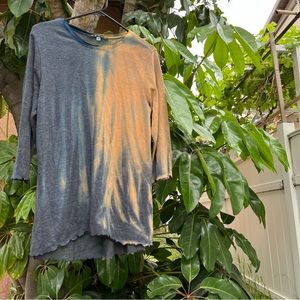Mezon tie dye oversized top with a lettuce hem.